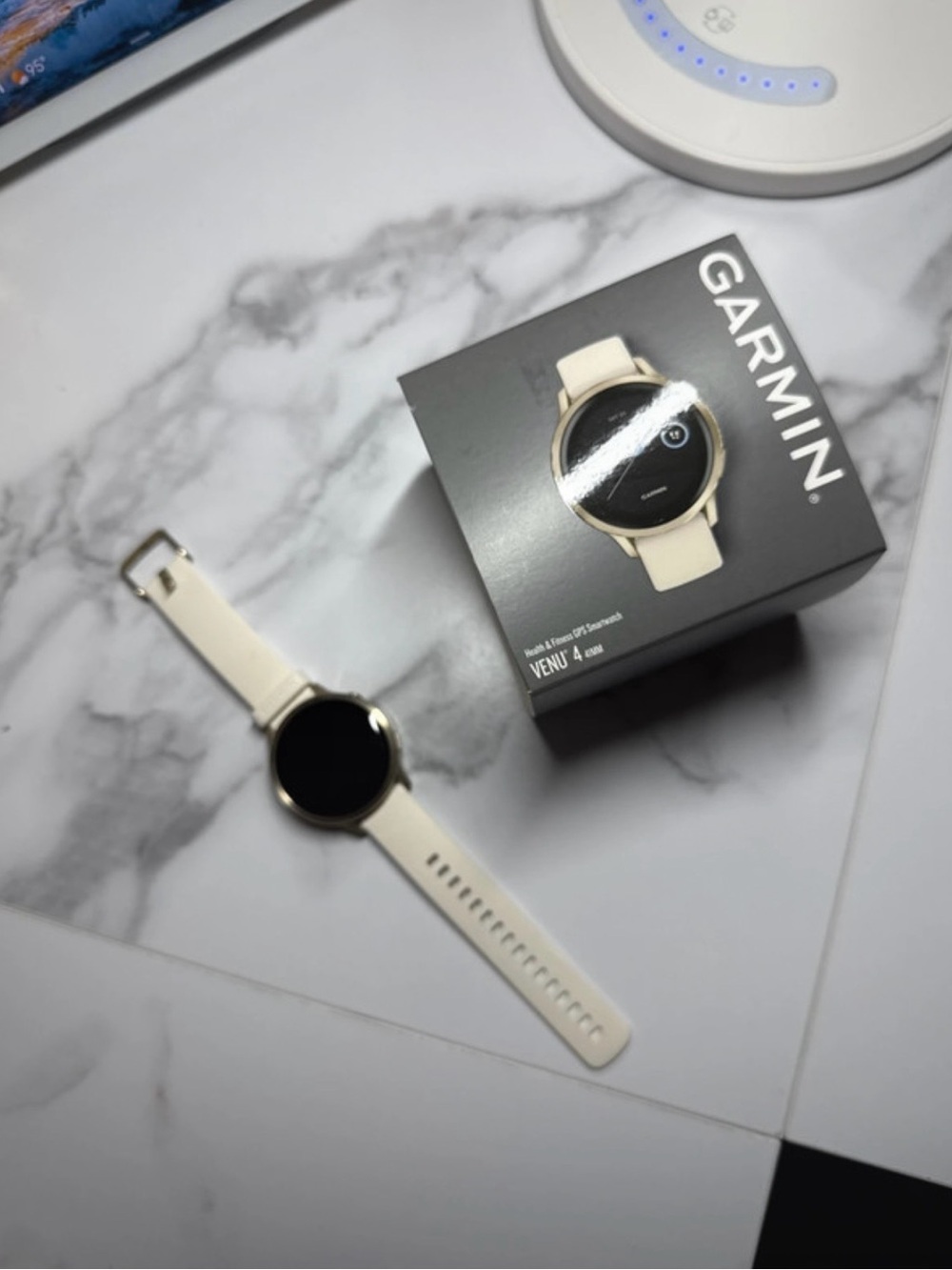 garmin Venu 4 Smartwatch in Cream and Gold